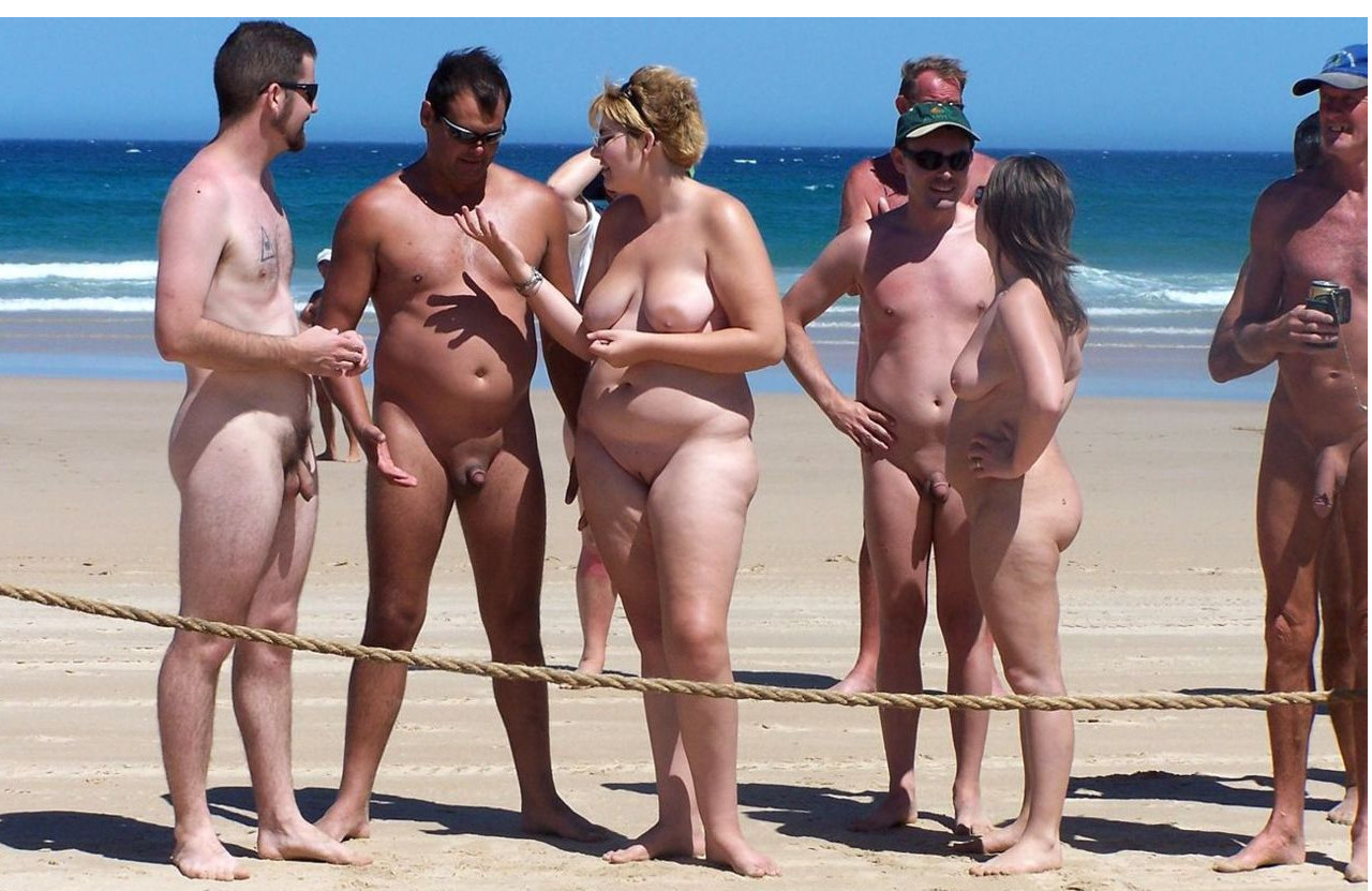 Naked families on beach 8